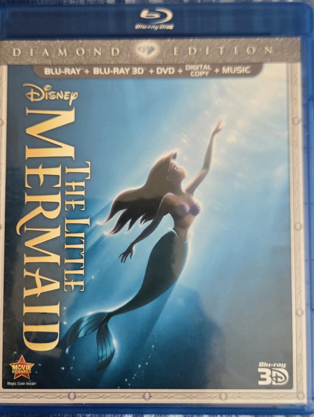 shows The Little Mermaid Diamond Edition combo pack in a blue Blu-ray case